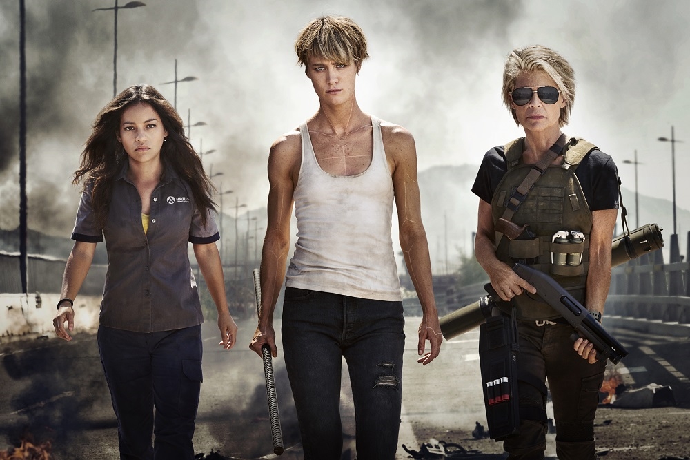 Official First Look at the Women of the New TERMINATOR (from left to right) Natalia Reyes as “Dani Ramos,” Mackenzie Davis as “Grace,” Linda Hamilton as “Sarah Connor”